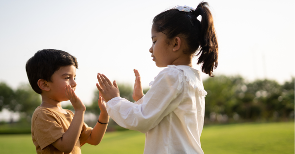 Children Engaging in Teamwork and Communication Exercises